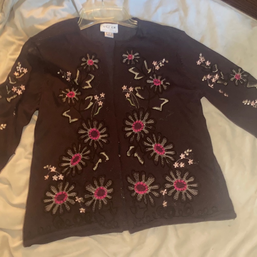 vintage cardigan ! It’s brown with stitched flowers all over it